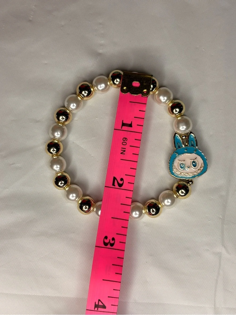 Kids Gold & Pearl Beaded Bracelet with Blue Character Charm
